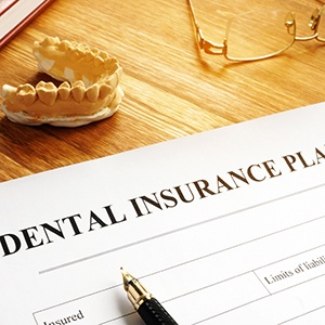 Dental insurance form on table at an El Cajon dental office 