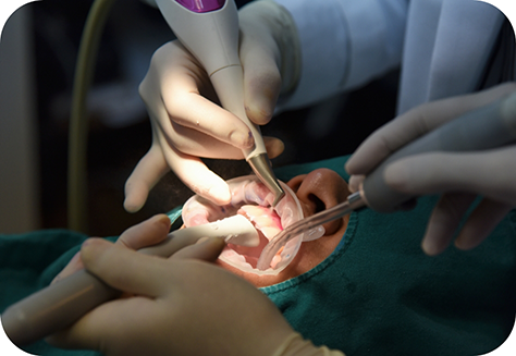 Patient being treated by emergency dentist
