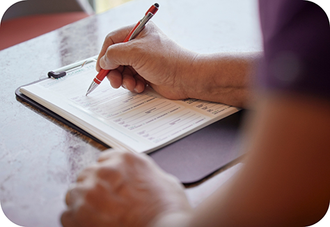 Filling out form on a clipboard