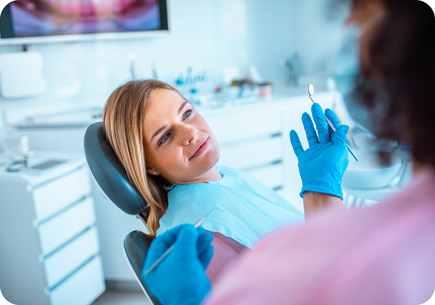 Female patient looking at dentist