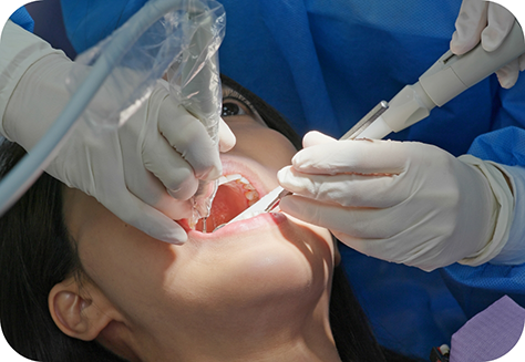Patient having root canal treatment performed