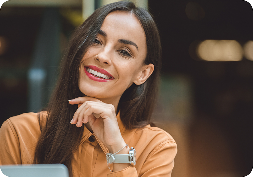 Close up of smiling woman with watch